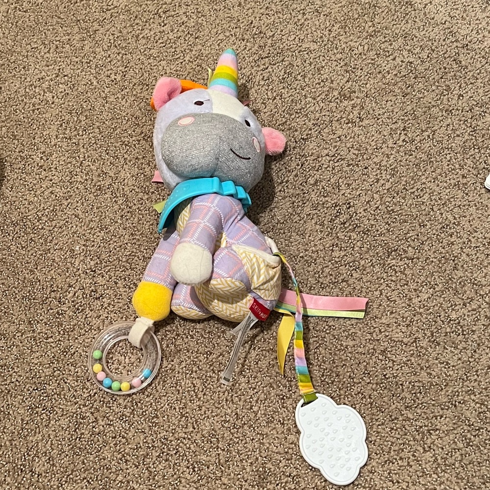 Purple unicorn skip hop baby toy